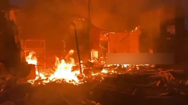 A fire near the Mayak market in Donetsk after being hit by Ukrainian MLRS.