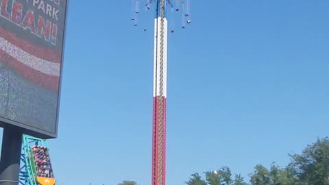 Riders Stuck In The Sky At Amusement Park