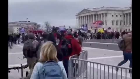Police opening gates waving people in to flood Capitol Hill