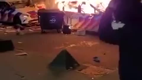 Police cars burn as the Dutch fight back against covid tyranny in Rotterdam.