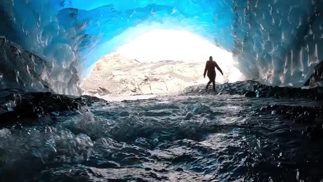 Exploring this glacier ice cave with