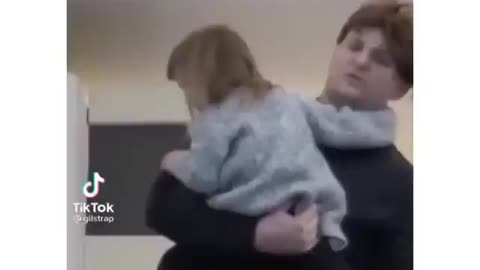 Baby takes father's hair