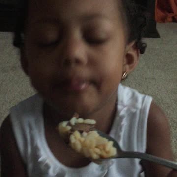 Girl With Notepad Tells Mom She's Busy When Mom Tries To Feed Her