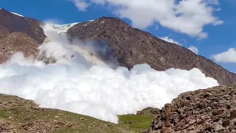 Snowfall through mountains