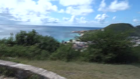 View over Sint Maarten with coast and harbours from a mountain