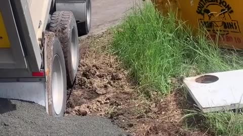 Tip Truck Trailer Topples Over While Unloading