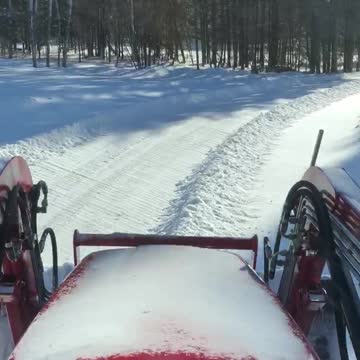 Mahindra 2638 clearing snow