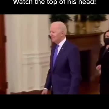 Bidan walking in the White House