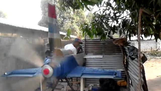 Pilot Algie Sanyang with His Prototype Plane