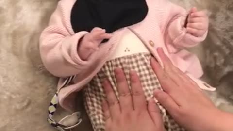 a baby's ticklish smile