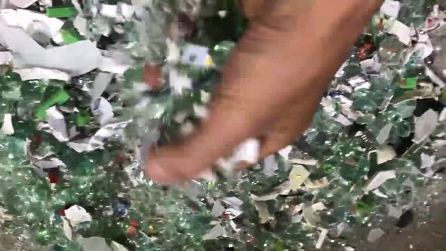glass ball put into metal crusher