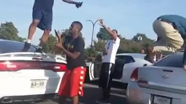 Collab copyright protection vibes - guy falls off car hood