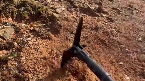 Cooking beef ribs in mud soil