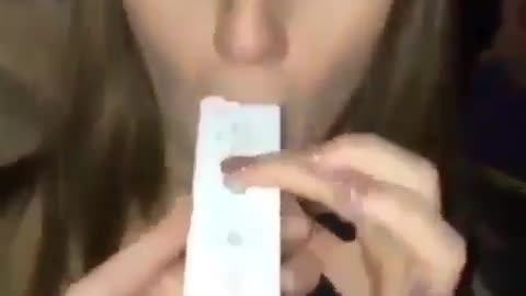 drunk girl singing over remotes