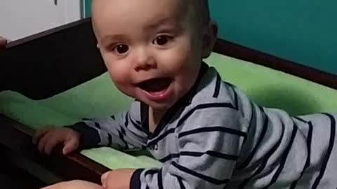 8 month old boy mimics moms tarzan yell.