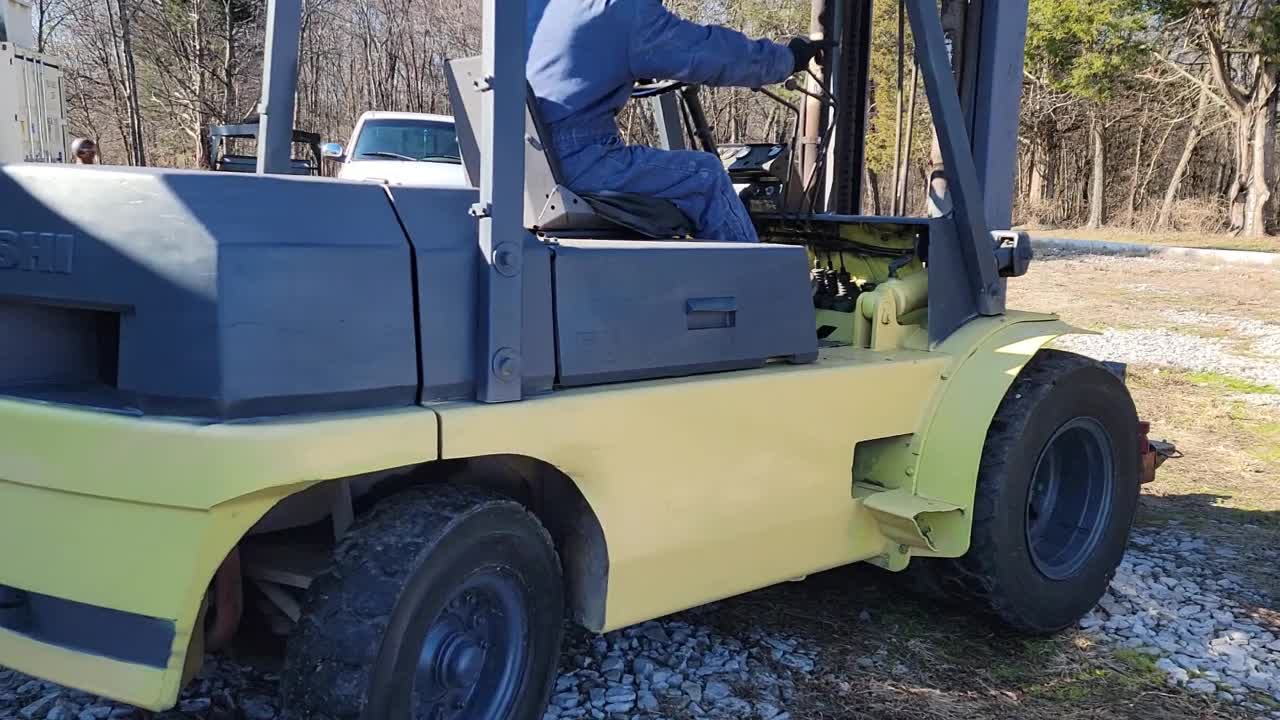 LIFTING A TRANSMISSION JACK WITH FORKLIFT