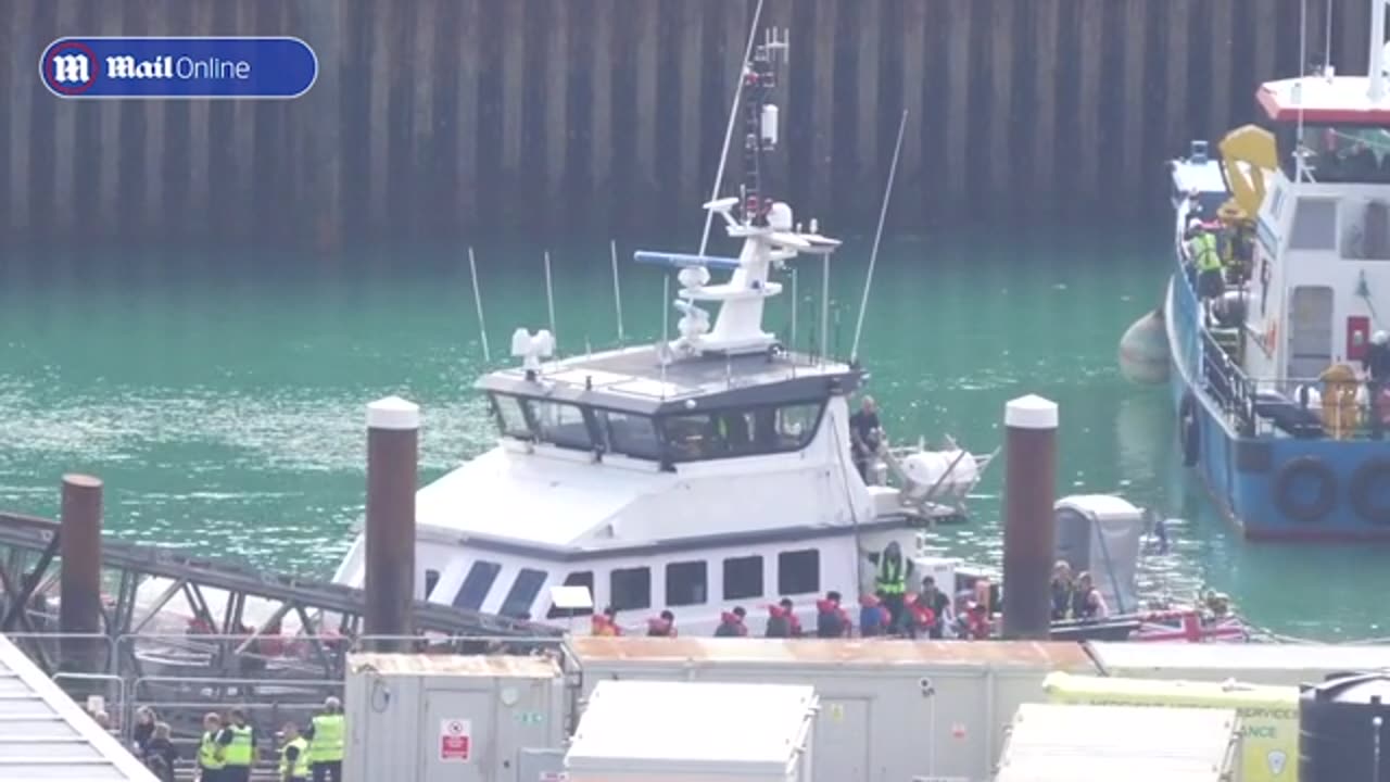 Migrants arrive by boat in Dover from France as Olympics kicks off