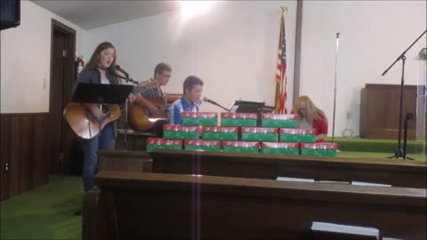 Josh, Liz and Daniel perform in church