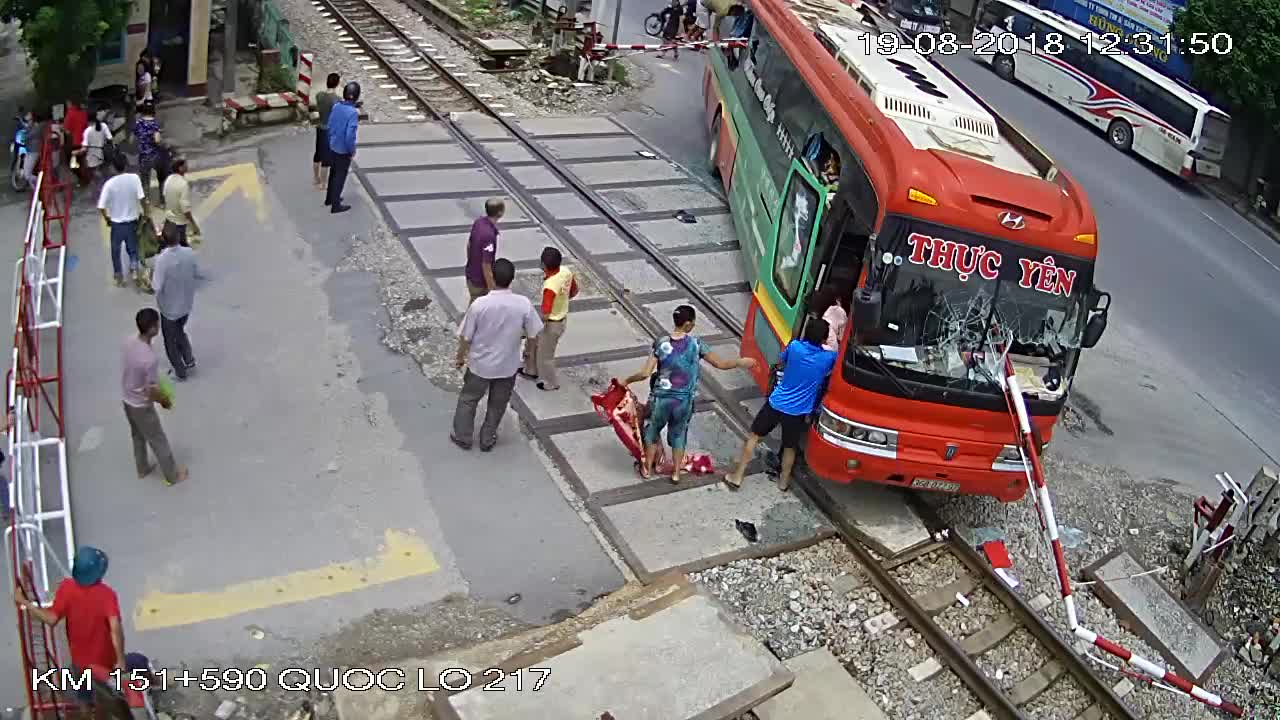 Bus Crashes Into Railroad Crossing Gate