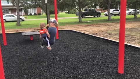 Mom knocks down kid on playground