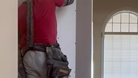 Cutting out drywall for a door frame