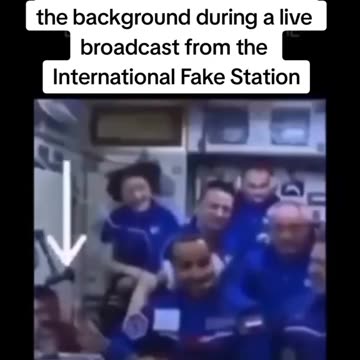 NASA's studio technician is still in the background during a live broadcast