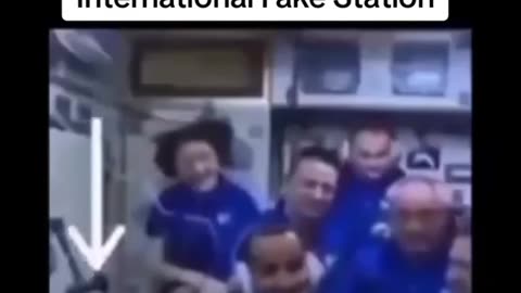 NASA's studio technician is still in the background during a live broadcast