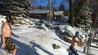 Polar plunge breaking through ice