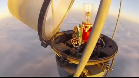 Changing a Bulb Atop a 2000 Ft Tower! just a normal day at the office....