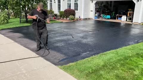 Professional Asphalt Spray Sealing: “The Square One” Top Coats Pavement Maintenance