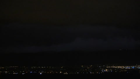 Lightning breaking through the night sky