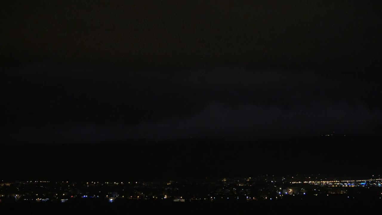 Lightning breaking through the night sky