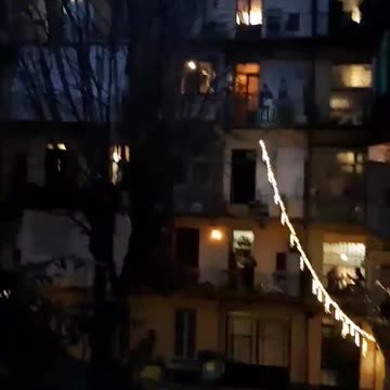 Torino neighbors organize aperitif party from their balconies