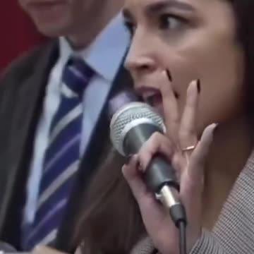 A.O.C heckled again at town hall