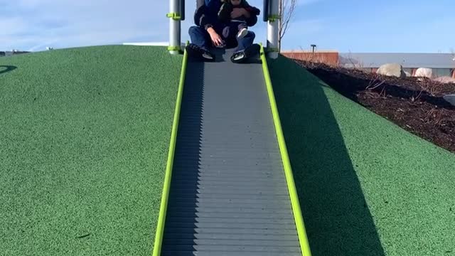happy to go down the slide