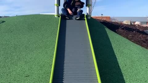 happy to go down the slide