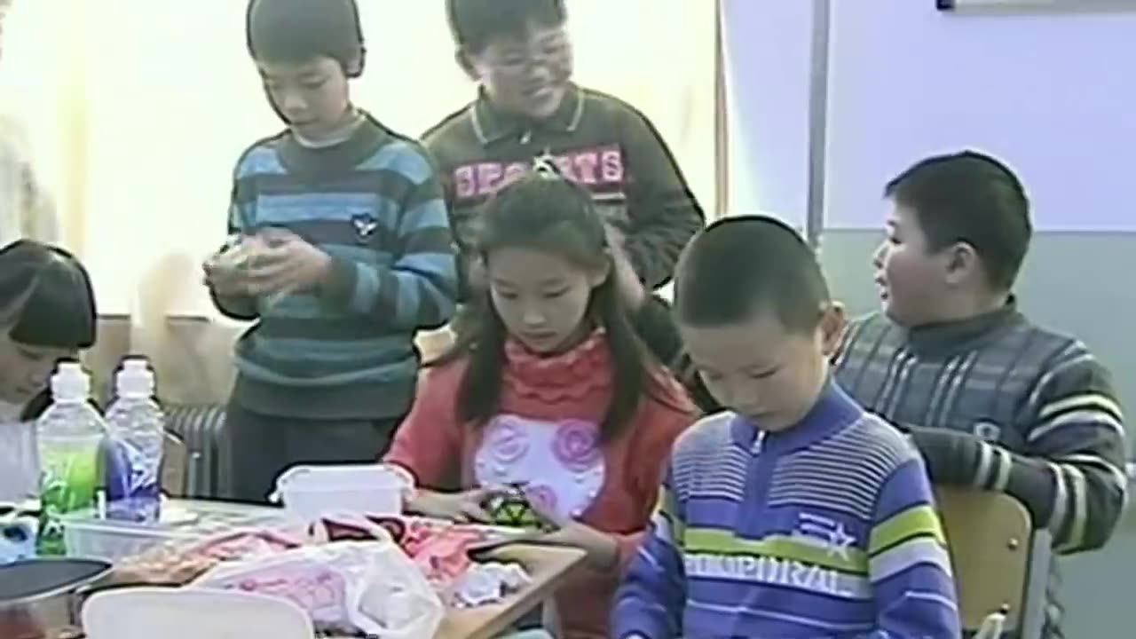 BOY SOLVES RUBIK'S CUBE
