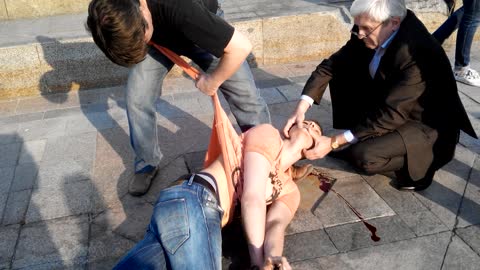 Two Ukrainians Slide Down a Building