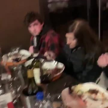 New Jersey Governor Phil Murphy is confronted while having dinner with his maskless family