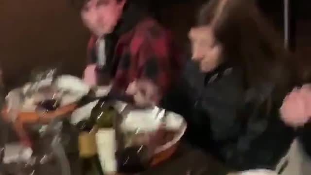 New Jersey Governor Phil Murphy is confronted while having dinner with his maskless family