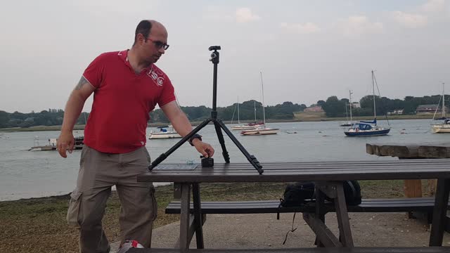 Setting up the GoPro on the tripod for a time lapse of river hamble