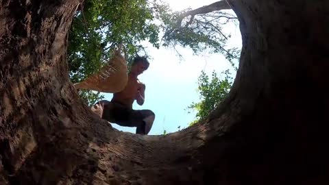 in the cave. The young man stood on the dangling green lotus