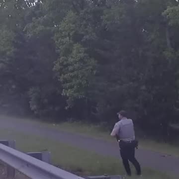 Dashcam video shows officer on side of road narrowly escape careening BMW #Shorts