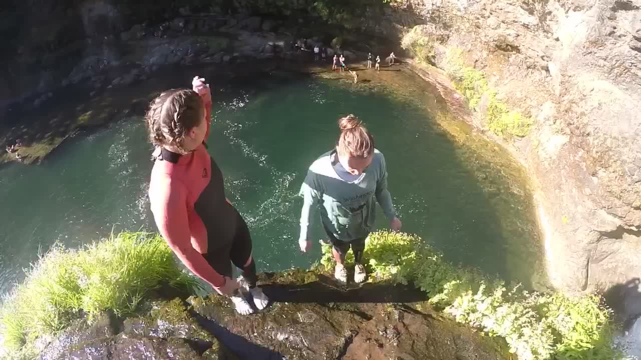 Girls perform side by side backflips from 40 feet