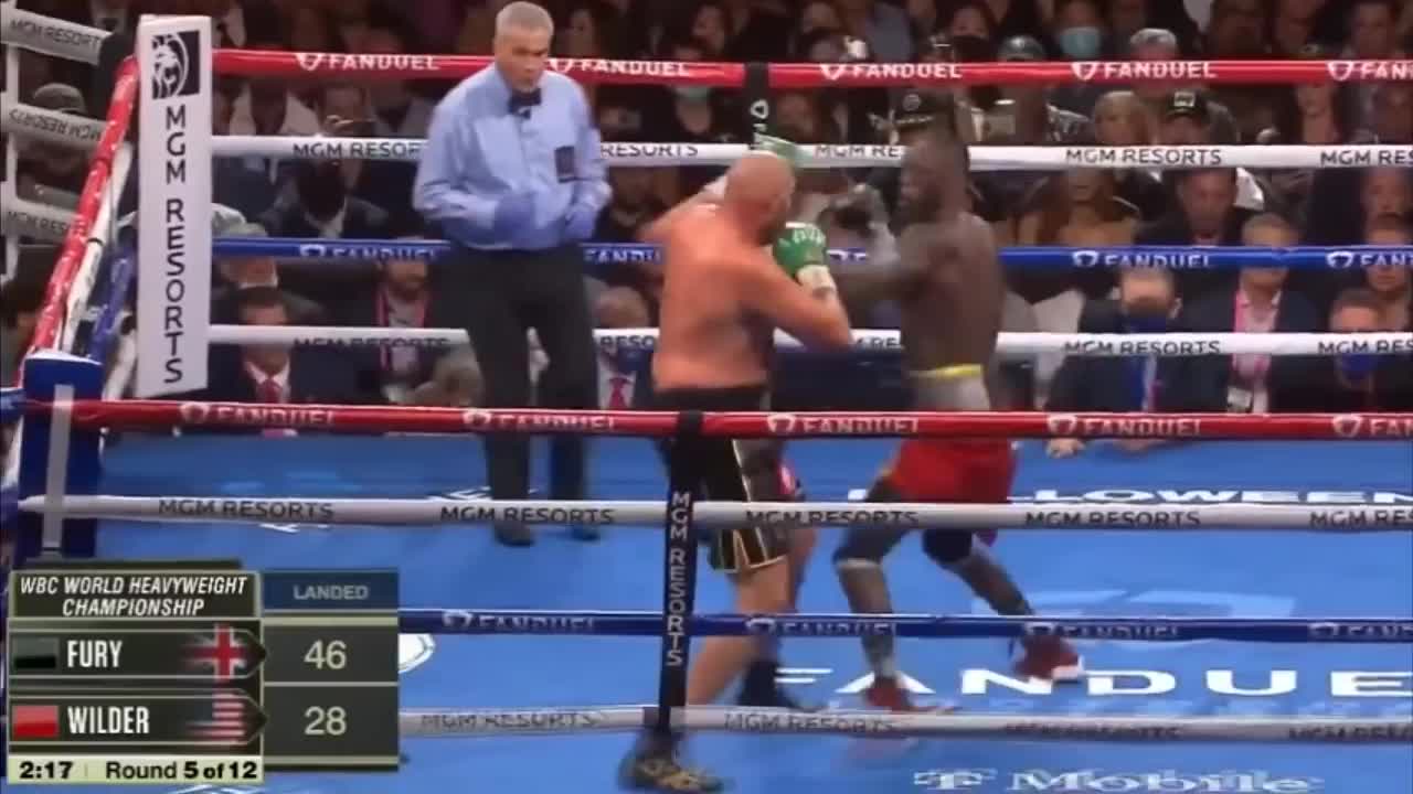 Tyson Fury beats Deontay Wilder by TKO in epic boxing match in which both survived knock downs