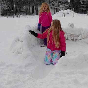 Girls igloo building