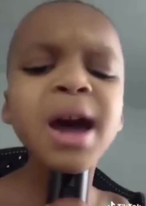 Kid uses grandmas voice box for auto tune
