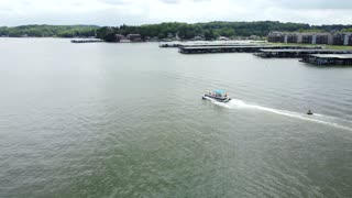 More boat chasing on a cloudy day.