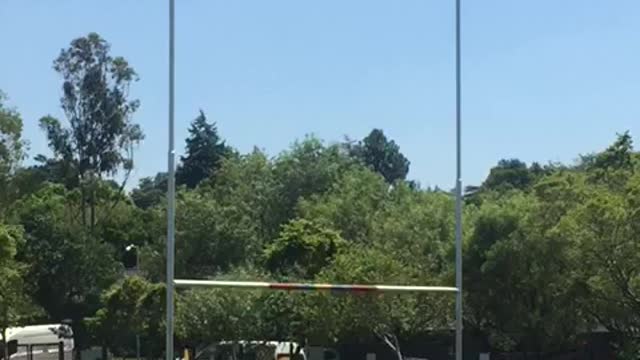 Cone Flip Lands on Top of Rugby Goals Post