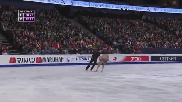 This young couple perform best ice skating dance in the stage.